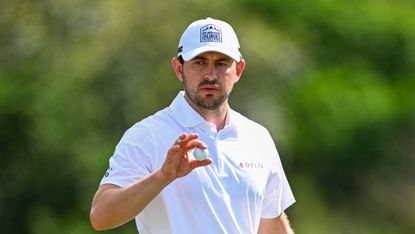 Patrick Cantlay shows his appreciation to the crowd while wearing a First Responders Children's Foundation cap at The Sentry in 2024