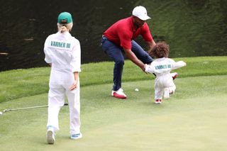 Varner iii and his wife on the green at the ninth hole