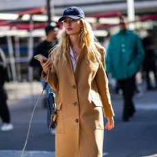 Street style outfit with camel coat