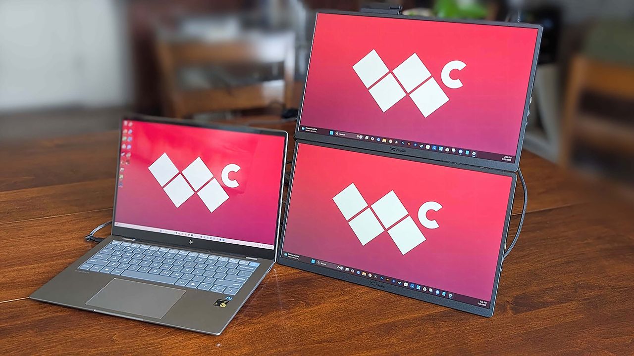 JSAUX FlipGo Horizon connected to a laptop with the monitors stacked one on top and one below it.
