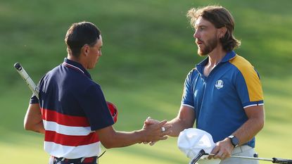 Rickie Fowler and Tommy Fleetwood shake hands at the Ryder Cup