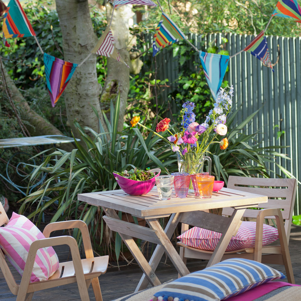 garden area with tea table and bunting