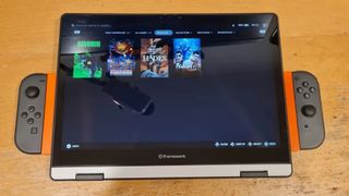 Sskki_TheBlindDemon's Framework 12 with Joy-Cons on the side