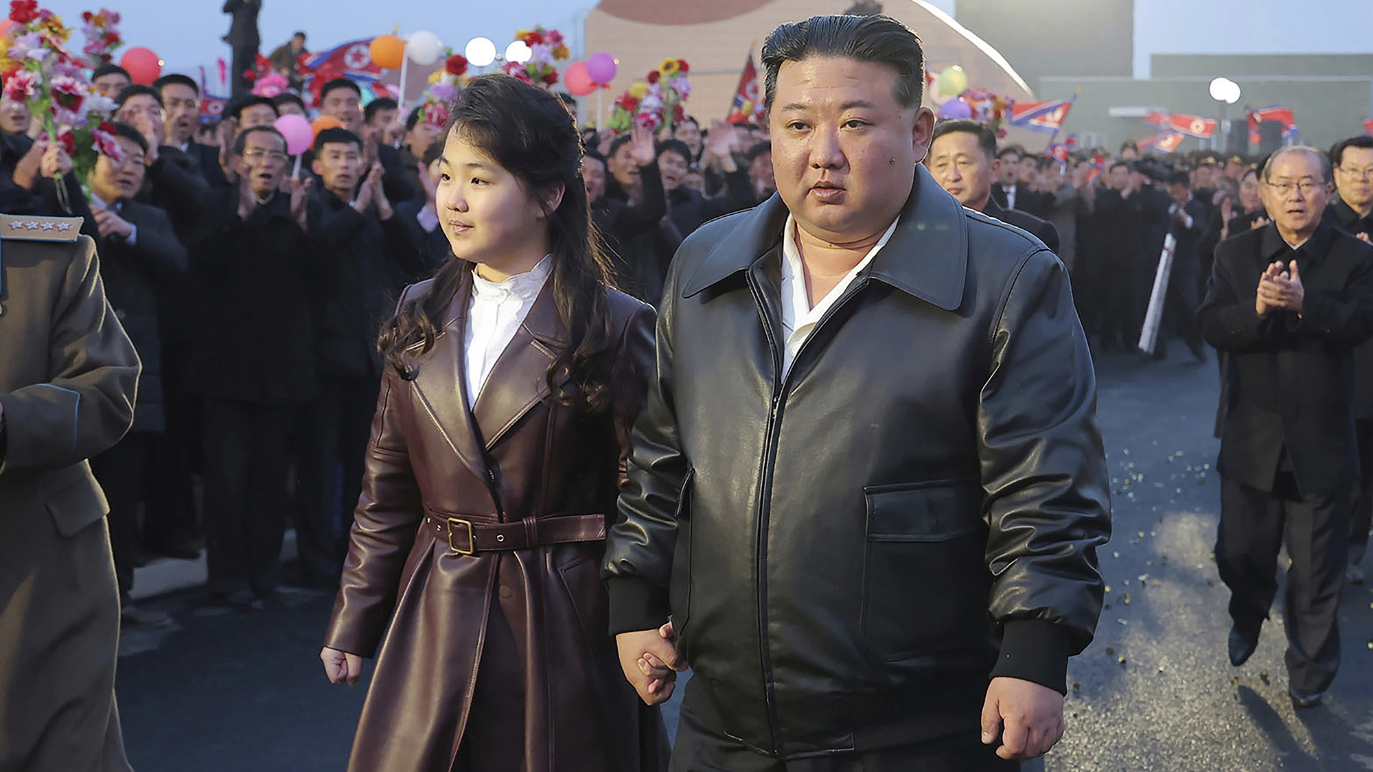 North Korean leader Kim Jong Un and his daughter attend a ceremony at Kangdong Greenhouse Farm in Pyongyang, North Korea