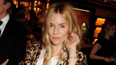 Sienna Miller attends Vogue's London Fashion Week dinner in 2013