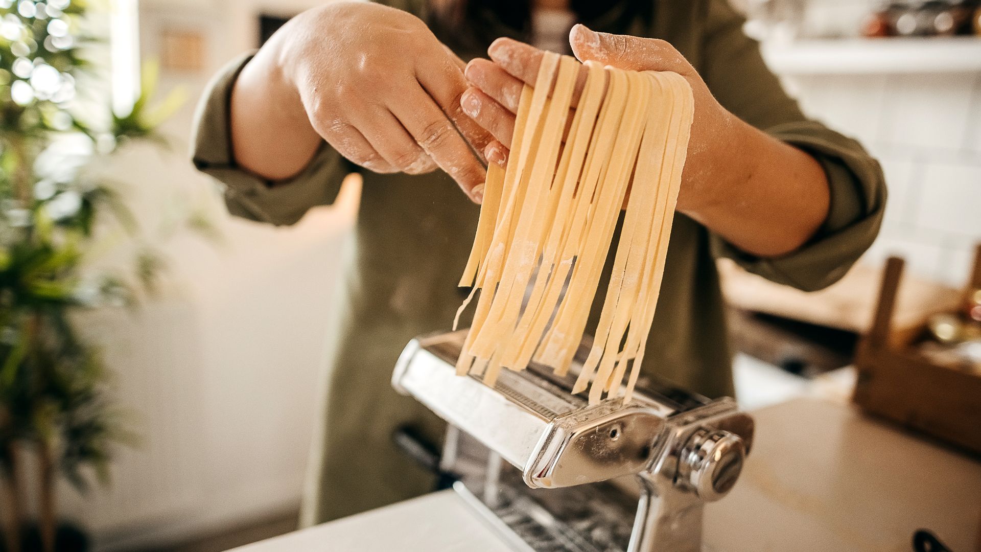 Woman making fresh pasta at home