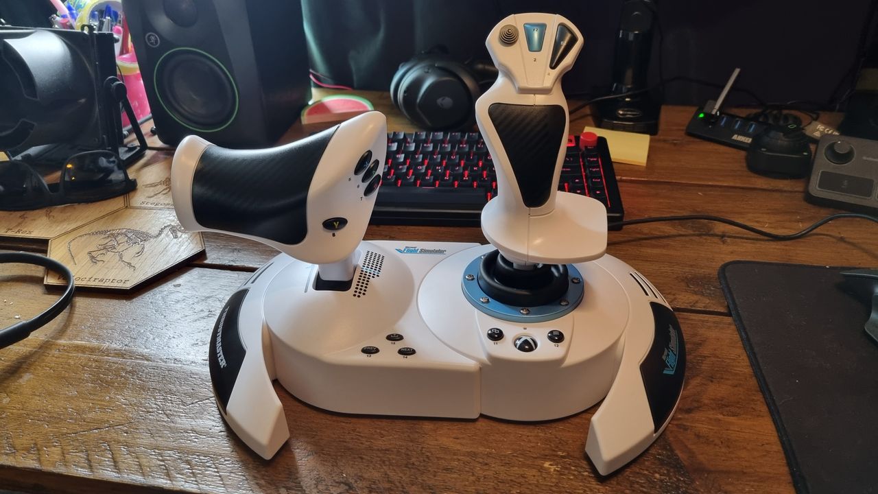 The controls of the Thrustmaster T.Flight HOTAS One Microsoft Flight Simulator Edition on a wooden desk