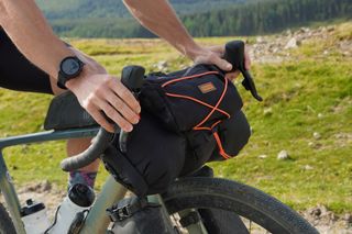 The Restrap Bar Bag - Large attached to the handlebars on the Scott Addict gravel