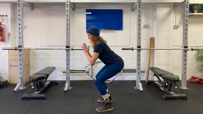 Woman holding a squat position