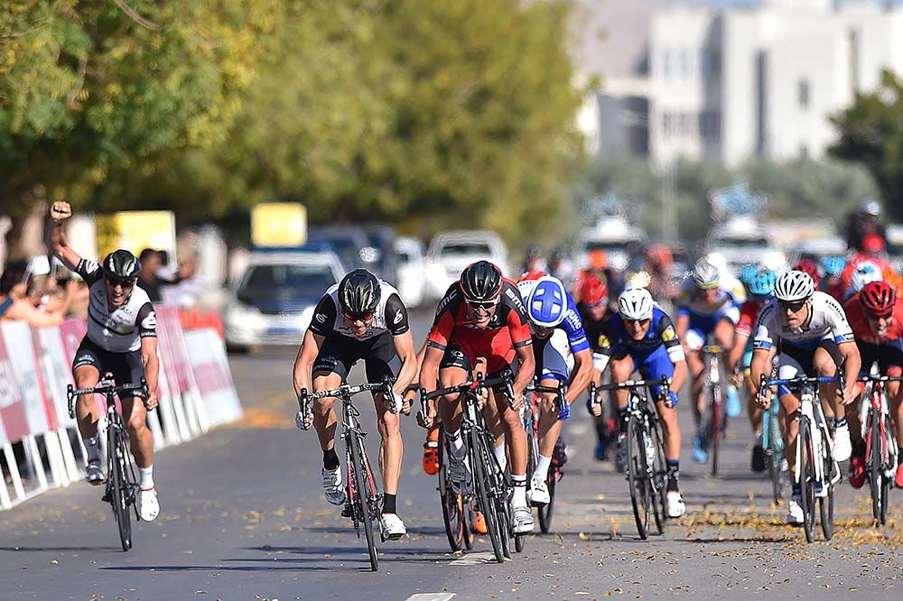 Edvald Boasson Hagen wins as his Dimension Data teammate celebrates early