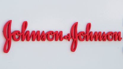 An entry sign to the Johnson & Johnson campus shows their logo in Irvine, California on August 28, 2019. 