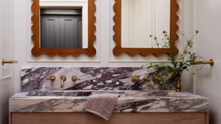 Marble bathroom countertop with double mirrors