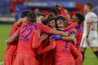 Chelsea players celebrate a memorable night in Spain