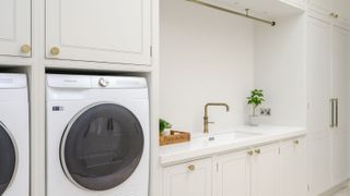 Pushka Home gold knobs in utility room