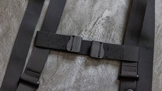 A close-up of the elastic coupler which come with the BlackRapid Double Breathe Dual Camera Harness Strap