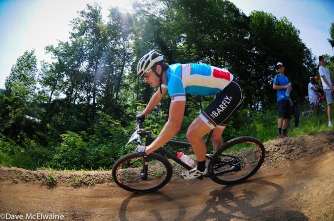 A rider using the downhill berms
