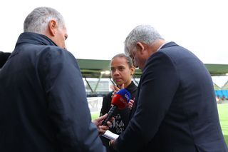 Iman Beney of Manchester City is interviewed with a translator during a training session open to the public advertised as the 'City are Back' event at Joie Stadium on August 05, 2025 in Manchester, England