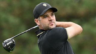 Corey Conners takes a shot in a practice round ahead of the Presidents Cup at Royal Montreal Golf Club