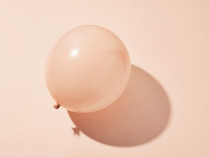 A beige balloon, symbolising the symptoms of PMS