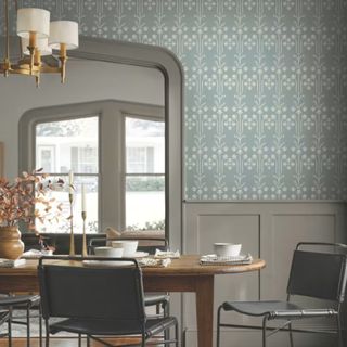 A room with floral wallpaper by Magnolia Home by Joanna Gaines