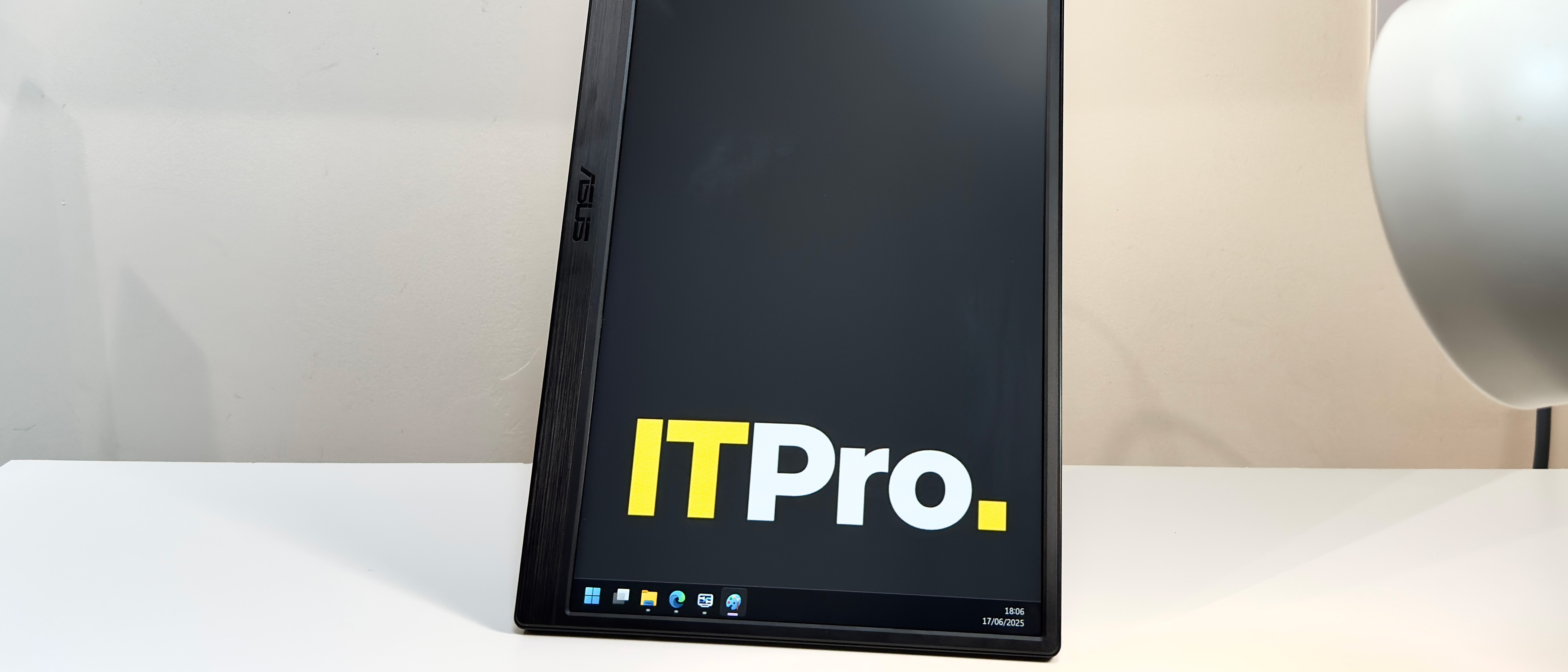 The Asus ZenScreen MB169CK on a desk