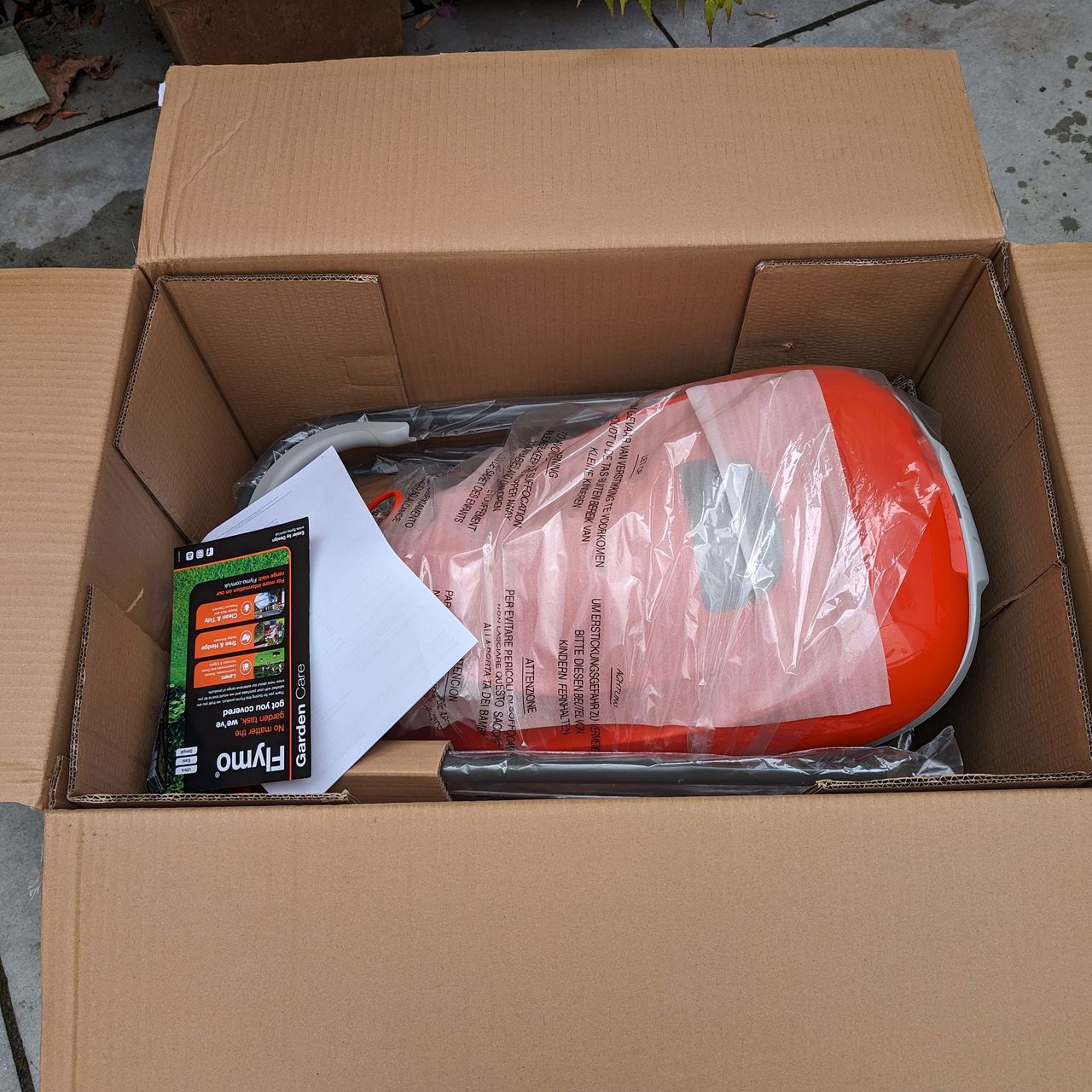 unboxing the flymo easiglide 300v electric hover lawn mower
