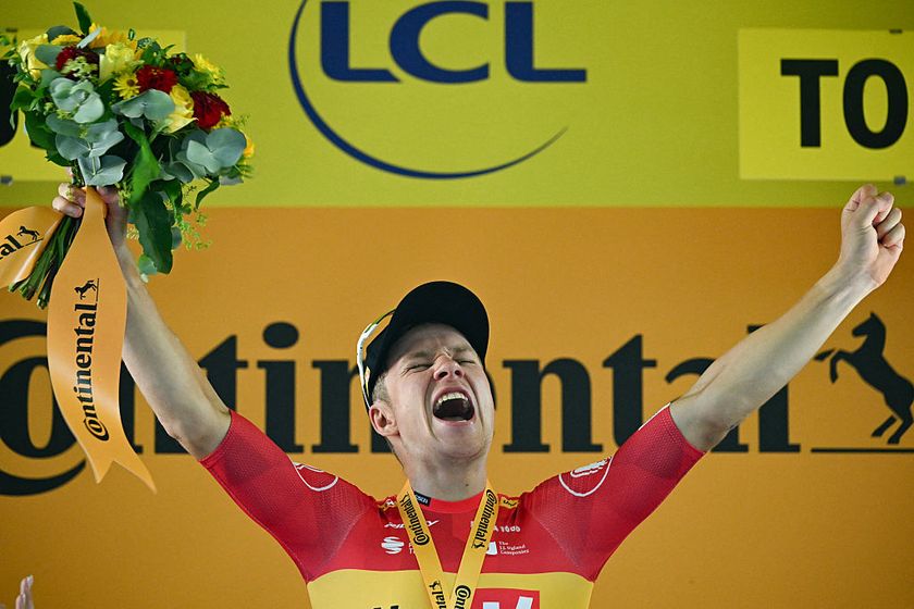 Uno-X Mobility team&#039;s Norwegian rider Jonas Abrahamsen celebrates on the podium after winning the 11th stage of the 112th edition of the Tour de France cycling race, 156.8 km starting and finishing in Toulouse, southwestern France, on July 16, 2025. (Photo by Loic VENANCE / AFP)