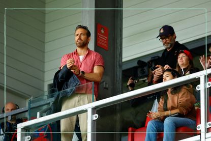 Ryan Reynolds watching a Wrexham football match