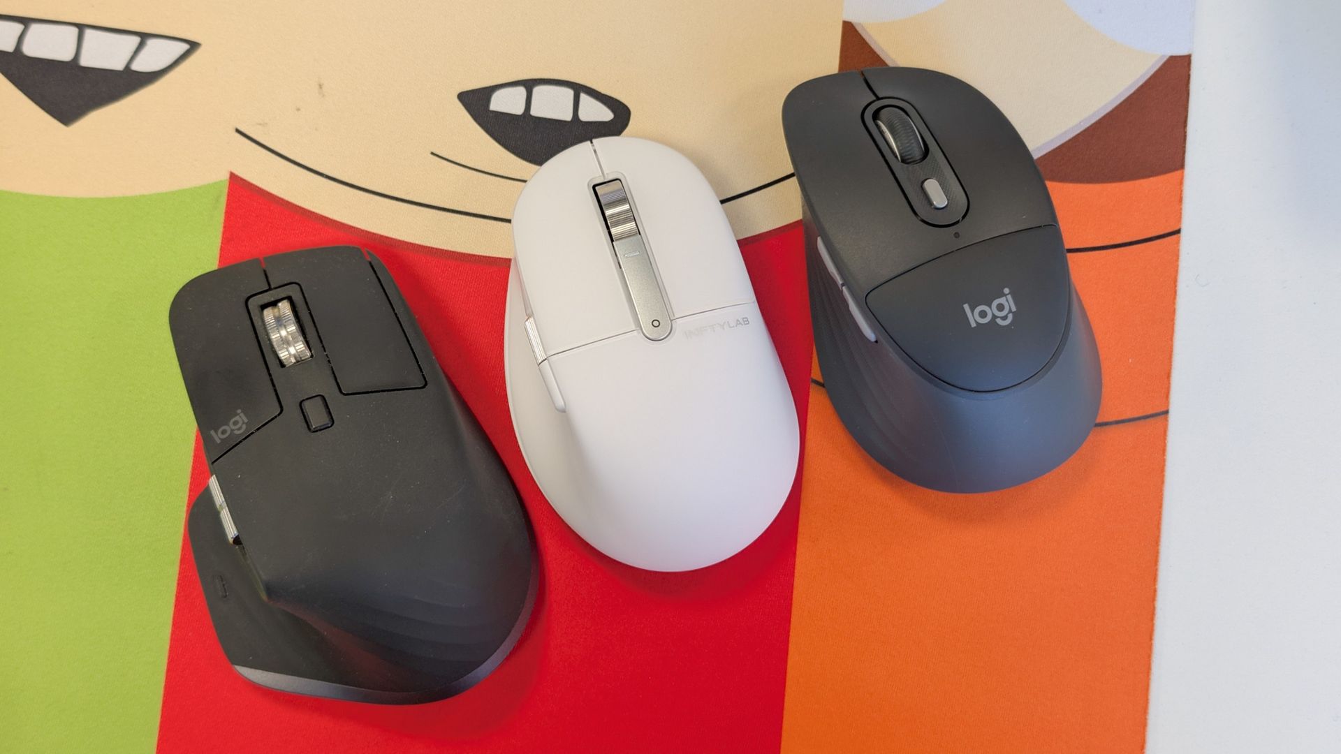 BenQ INFTYLAB M Mouse PS01 next to two other micec