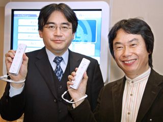 Nintendo game director Shigeru Miyamoto showing off a Wii controller