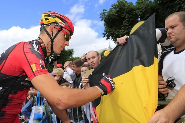 Belgian fans get an autograph from Philippe Gilbert