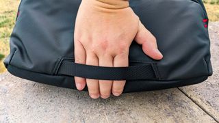 Tomtoc Carrying Case hand strap.