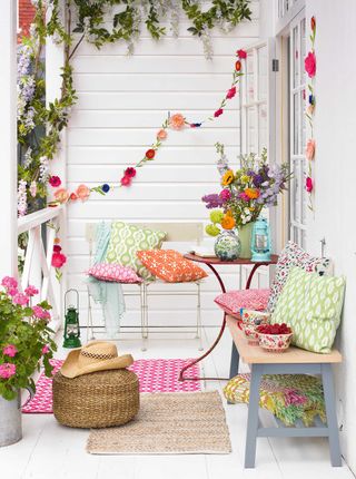 white porch with brightly colored accessories