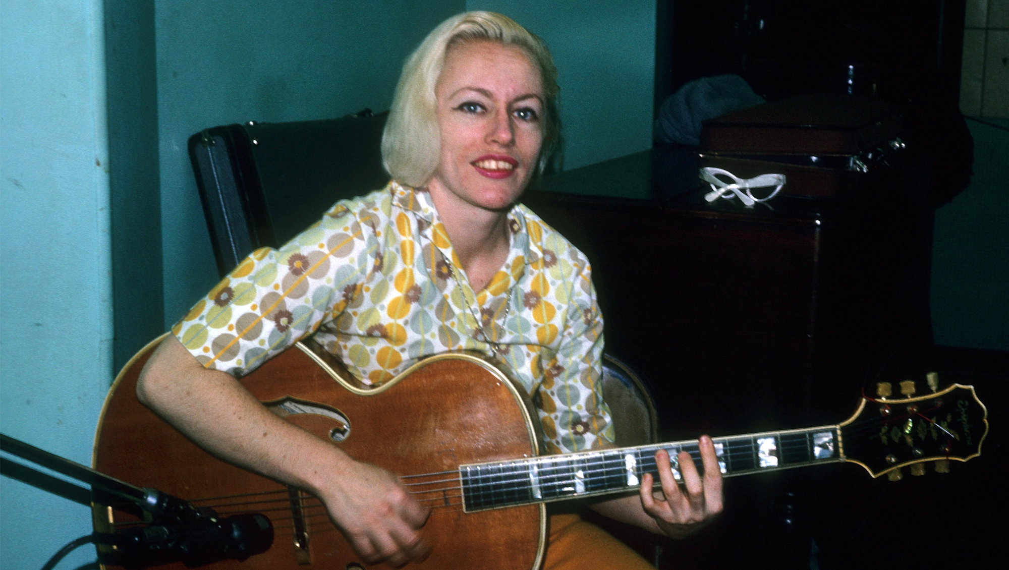 Bassist Carol Kaye plays an Epiphone hollowbody electric guitar in April 1966 in Los Angeles, California.
