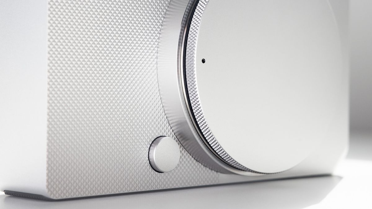 Sigma BF with its body cap, on a white surface in strong light, with defined shadows