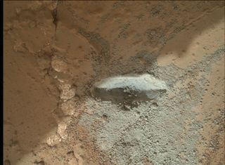 Curiosity Rover Hammers into Mars Rock
