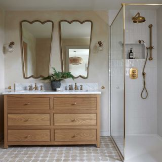 a bathroom with an encaustic tile floor