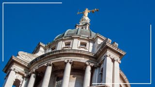image of the Old Bailey agains blue sky