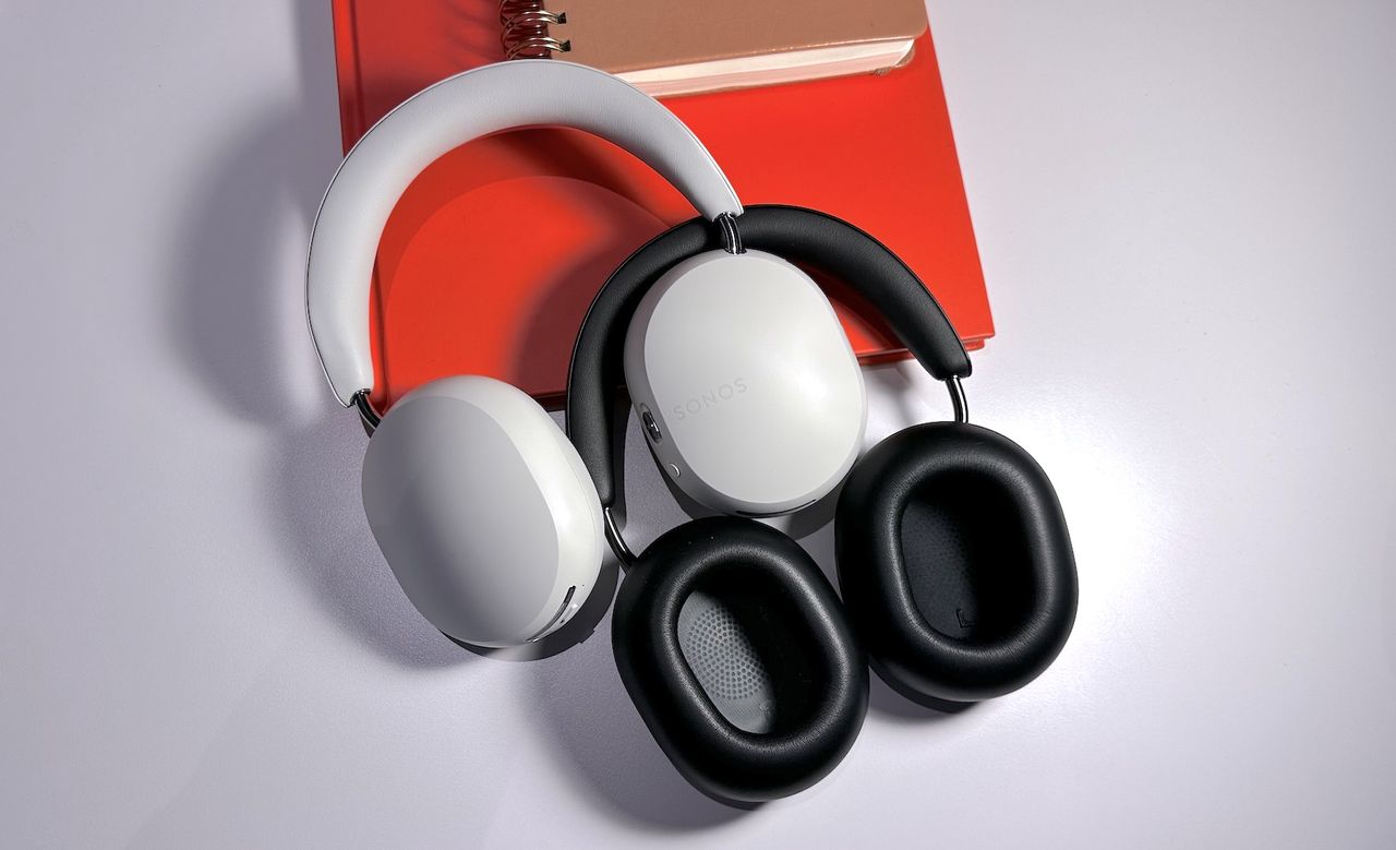 Sonos Ace black and white headphones on table