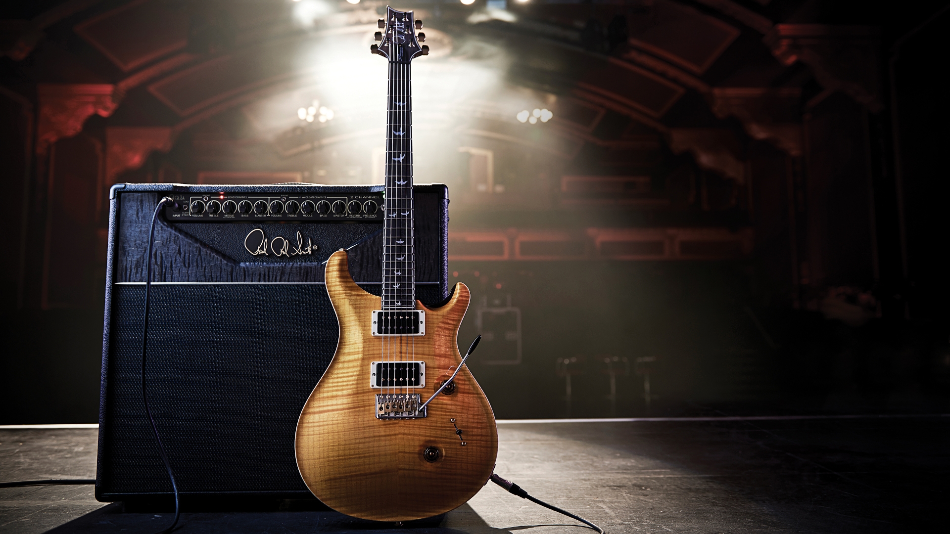 A PRS Custom 24 on stage with a PRS guitar amplifier