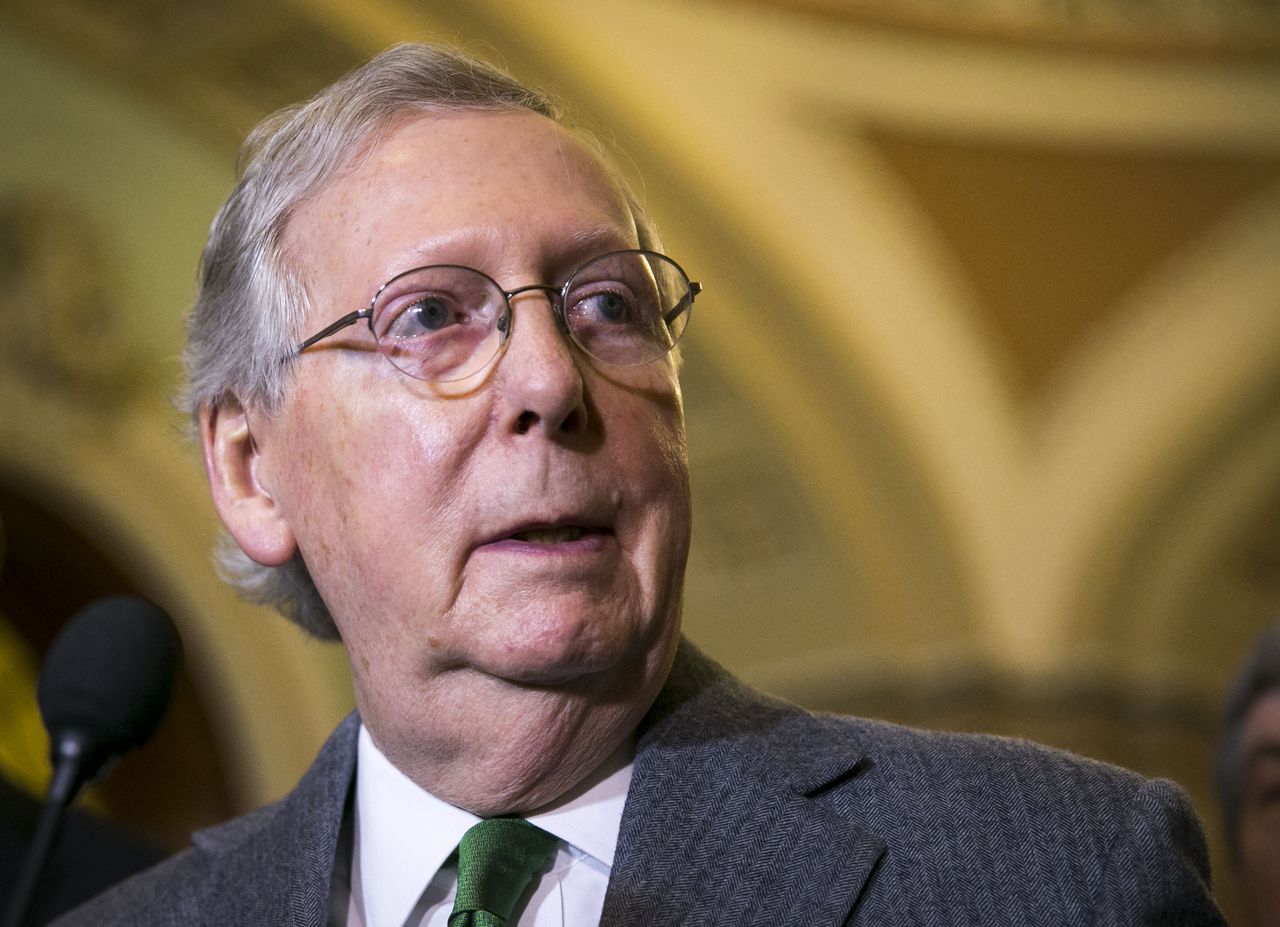 Mitch McConnell talks with reporters on Capitol Hill