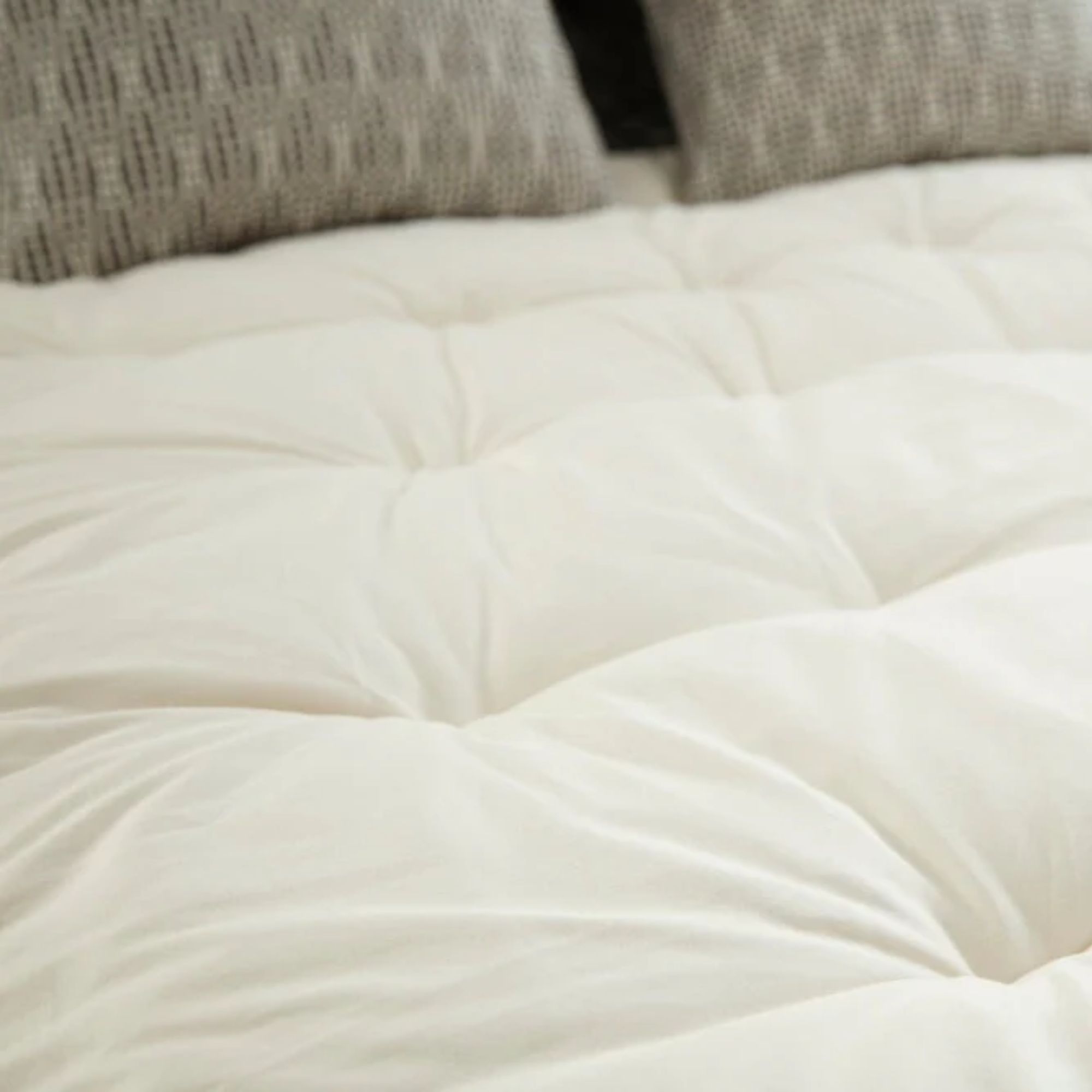 White mattress topper
