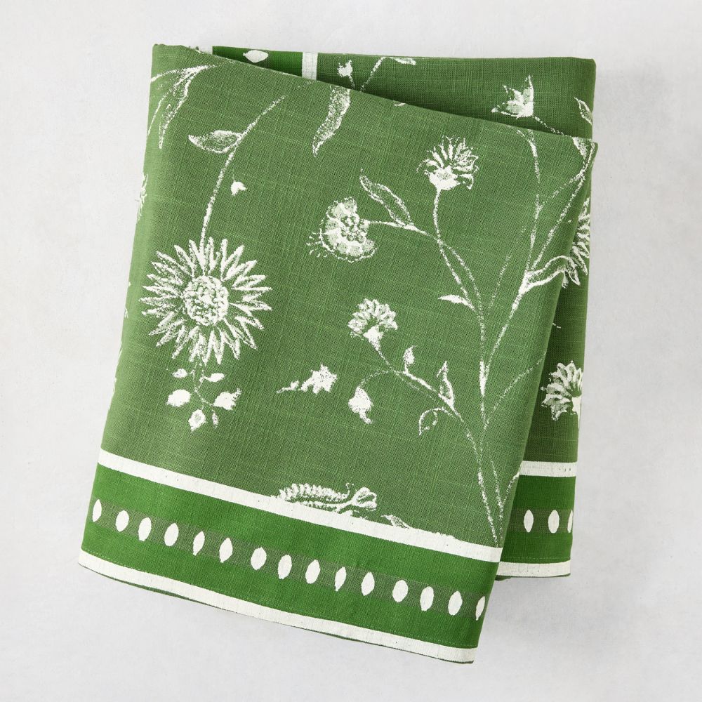 Green patterned tablecloth folded