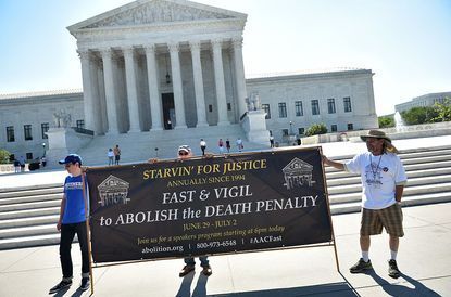 Advocates for abolishing the death penalty protest before Supreme Court