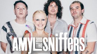 A portrait of Amyl And The Sniffers against a white wall