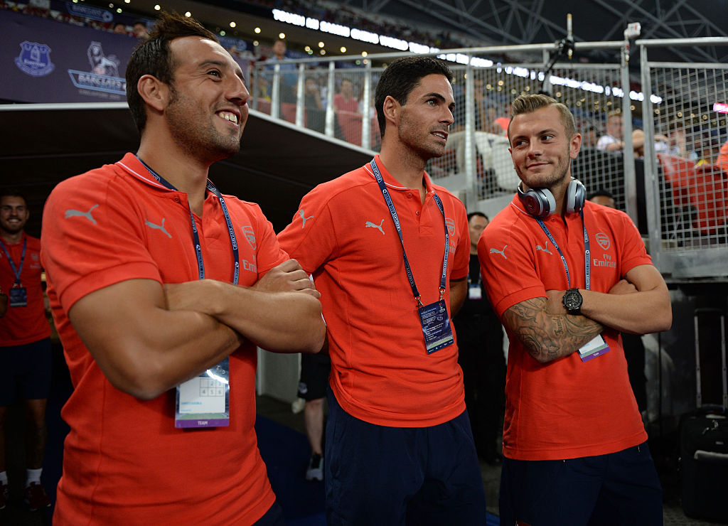 Santi Cazorla, Mikel Arteta and Jack Wilshere of Arsenal before the match between Arsenal and Singapore XI at Singapore National Stadium on July 15, 2015 in Kallang.