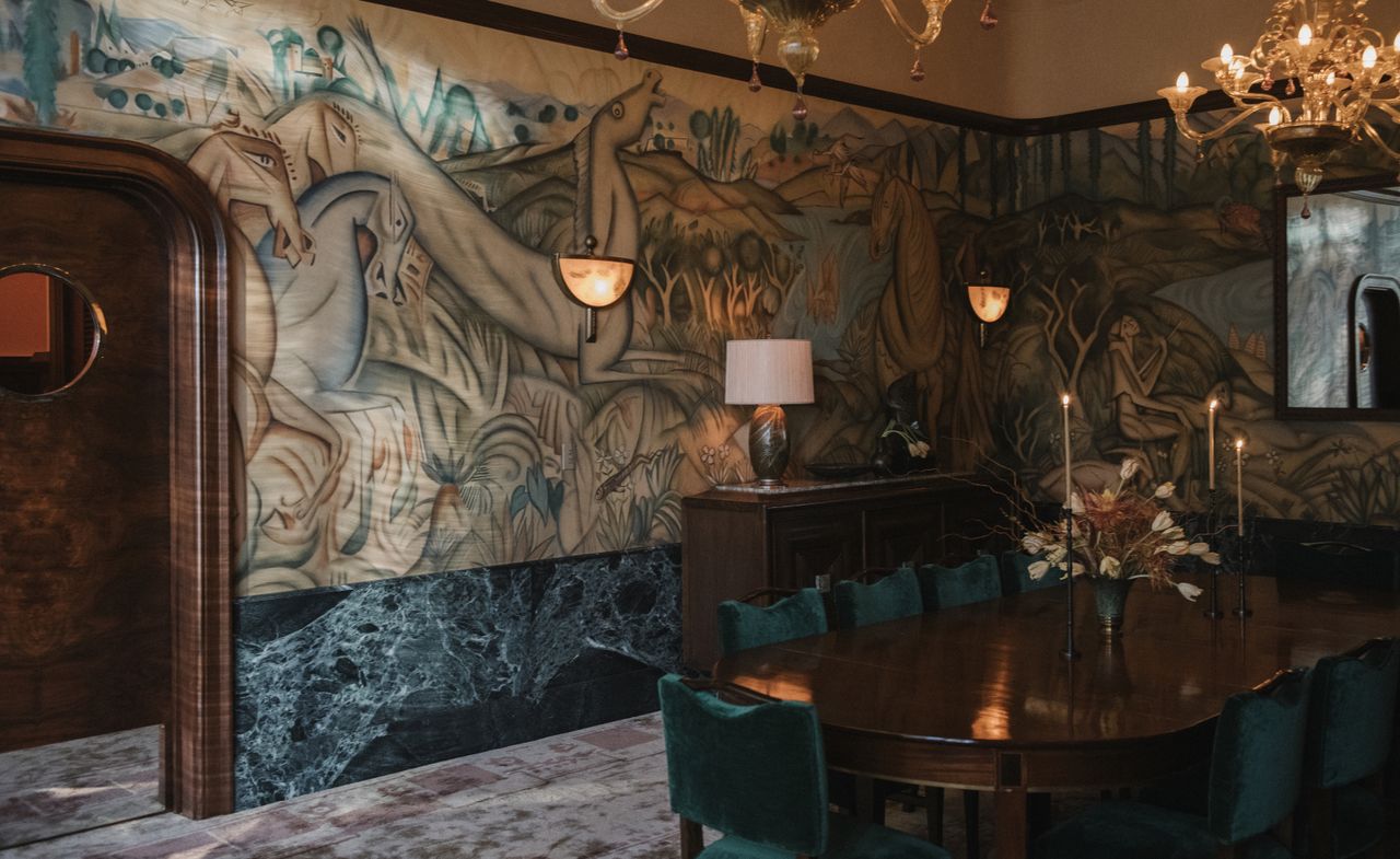 Inside Locanda Verde Hudson Yards New York restaurant, with opulent interiors and murals on the walls