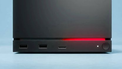 Valve Steam Machine photo with close up of light on front switched to red.