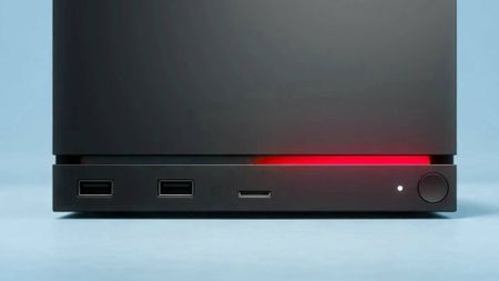 Valve Steam Machine photo with close up of light on front switched to red.
