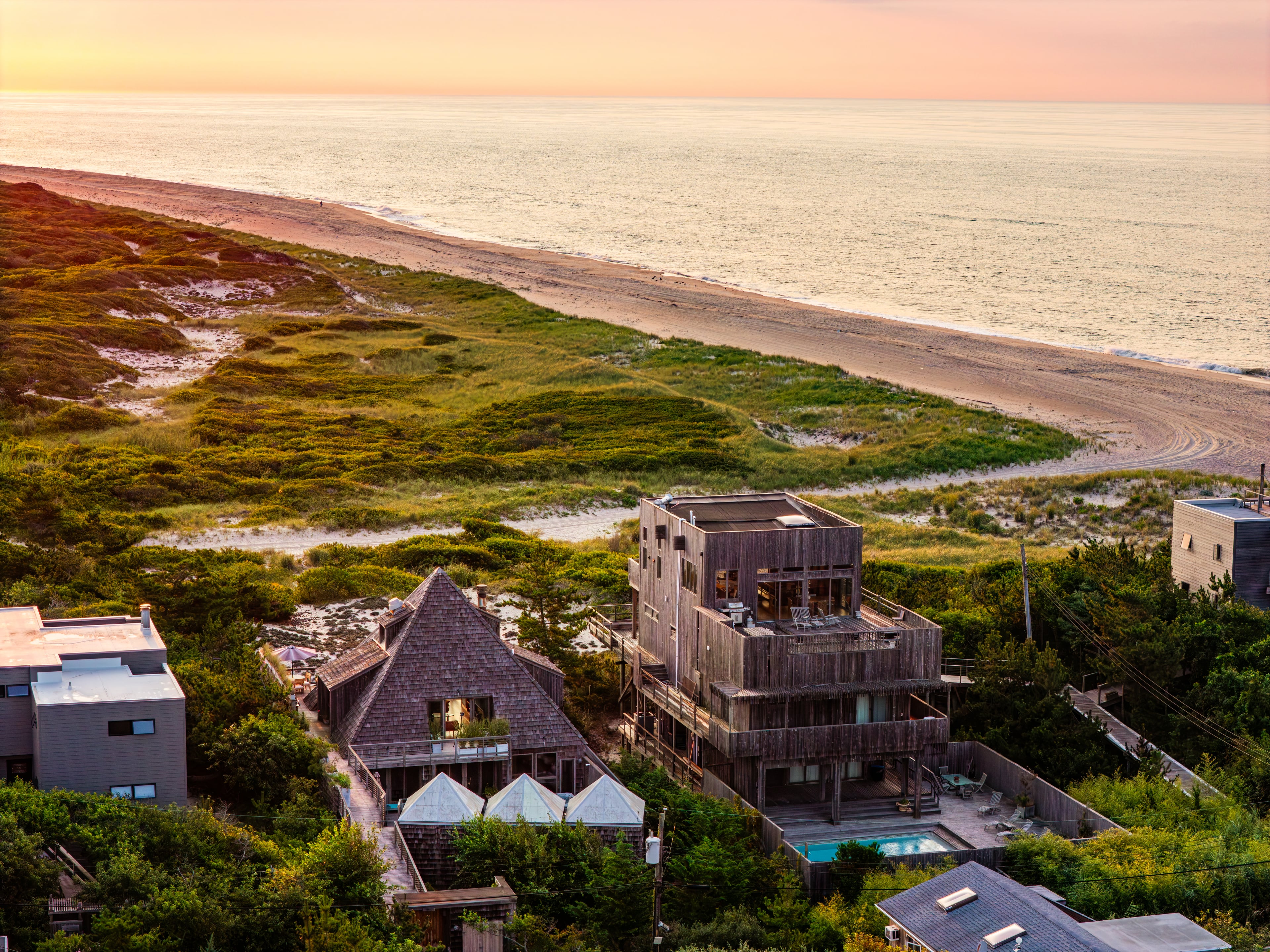 The house has dramatic beach and bay views